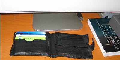 A picture of my wallet on my computer desk A picture of my wallet